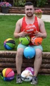Rob with the colourful footballs he is taking to Malawi 