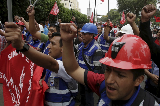 Mining workers march during a national strike in Lima
