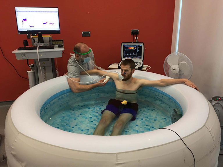 Man in hot tub being tested