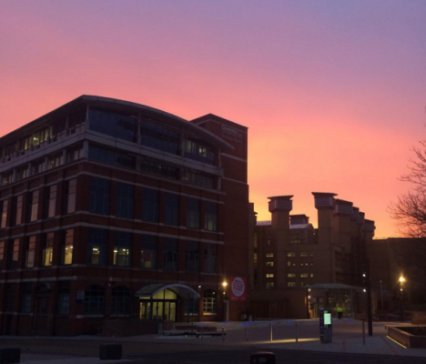 Sunrise behind the William Morris Building.