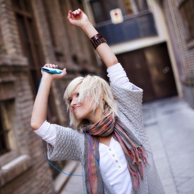 Girl-happily-dancing-in-street