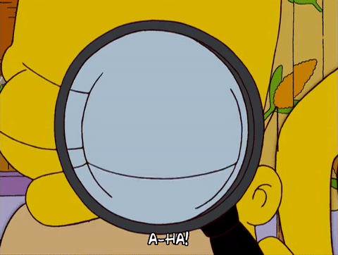Homer-Simpson-looking-through-magnifying-glass-gif