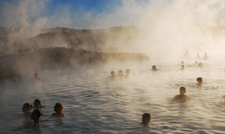 lots of people in natural hot springs