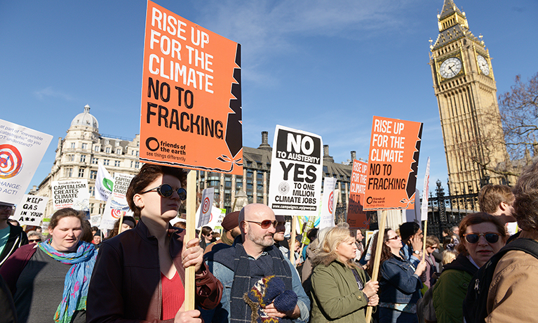 people protesting in London against fracking