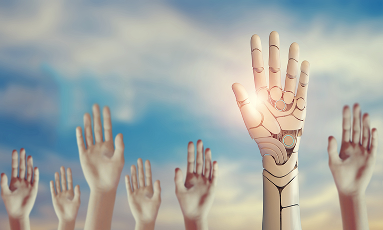 Human hands and one robotic hand reaching up into the sky